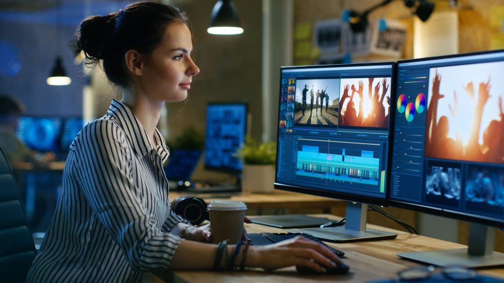 a woman editing a video using Adobe Premiere Pro