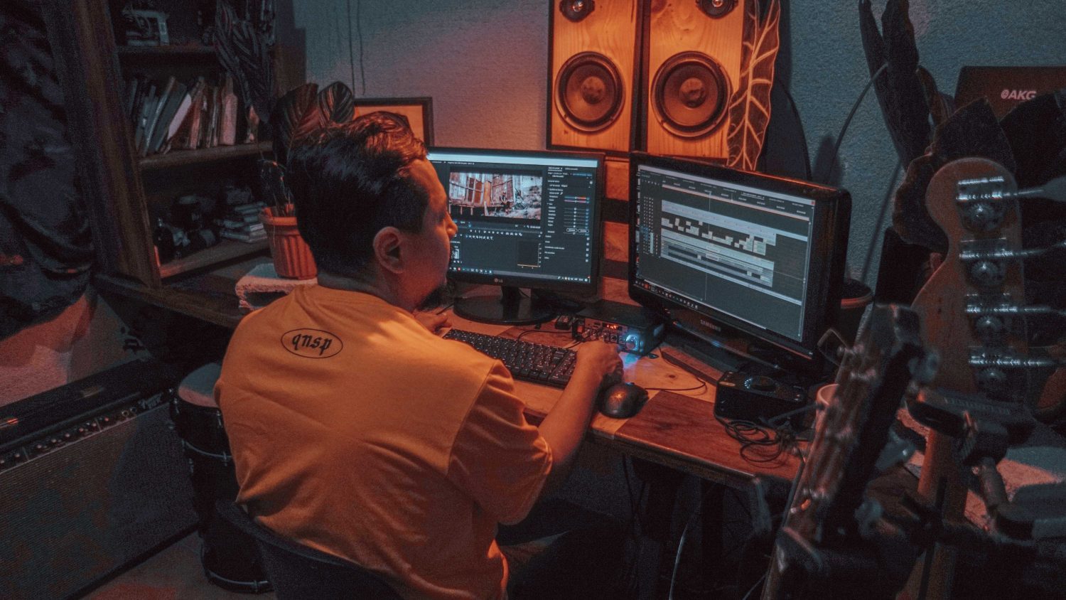 a man editing a video on adobe premiere pro