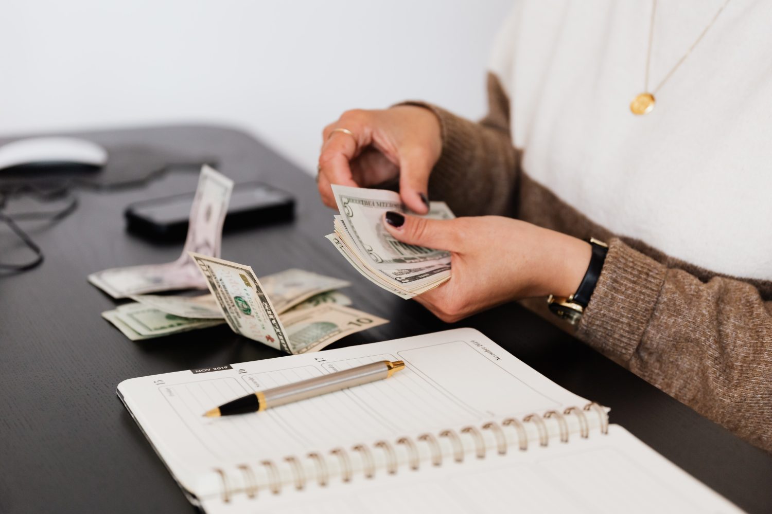 a woman counting money